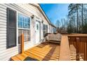 Cozy front porch features a wooden bench and a well-manicured entrance, creating a welcoming curb appeal at 4845 Midway Sand Rd, Hickory, NC 28601