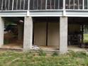 Storage area under home, including extra access door and vehicle parking at 6813 Navajo Trl, Sherrills Ford, NC 28673