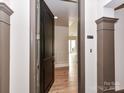 An inviting entryway featuring a door, and view of the bright and airy living space at 4625 Piedmont Row Dr # 410, Charlotte, NC 28210