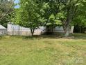 Exterior view of a single-story home and mature trees at 6504 Denver Heights Cir, Denver, NC 28037