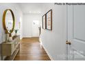 Bright entryway featuring hardwood floors, neutral walls, and decorative accents at 135 Meadow View Dr, Statesville, NC 28677