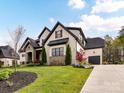 Stunning two-story home with a side entry garage and professionally landscaped yard at 2954 Holbrook Rd, Fort Mill, SC 29715
