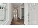 Inviting entryway featuring hardwood floors, neutral walls, and a clear view into the home at 2031 Skyhawk Dr, York, SC 29745