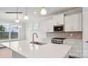 Modern kitchen with a large island, stainless steel appliances, and ample counter space at 2053 Skyhawk Dr, York, SC 29745