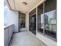 Enjoy the open balcony with plenty of light streaming in through sliding glass doors at 222 S Caldwell St # 1909, Charlotte, NC 28202