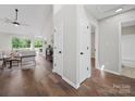 Bright foyer boasts hardwood floors, neutral walls, and flows into a living area at 4101 New Castle Ln, Monroe, NC 28110