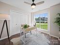 Cozy office space with a large window providing natural light and view of the outdoors at 4101 New Castle Ln, Monroe, NC 28110