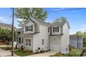 Picture of the backyard with an attached garage and driveway of this cozy home at 414 King St, Waxhaw, NC 28173