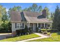 Inviting single-story home with a well-maintained lawn, traditional architecture, and lovely landscaping at 1002 4Th Ne St, Conover, NC 28613