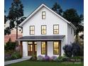 Inviting two-story modern farmhouse boasting a covered front porch and well-manicured landscaping at 1427 Rankin Ave, Gastonia, NC 28052