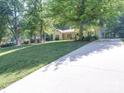 View of a ranch-style home, with a long driveway at 145 Woodview Dr, Statesville, NC 28625