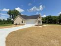 A newly constructed home has a two-car garage with driveway at 3650 Sentry Rd, Lancaster, SC 29720