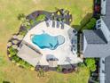 Aerial shot of the backyard pool, patio area, outdoor kitchen and meticulously manicured landscaping at 754 Culp Ferguson Rd, Lancaster, SC 29720