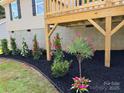 Beautiful garden featuring colorful flowers and mulch beds, adding a vibrant touch to the property at 953 Hardin Dr, Shelby, NC 28150