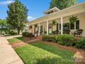 Lovely home featuring a spacious porch, showcasing a delightful spot for relaxation and outdoor enjoyment at 170 8Th Ave, Cramerton, NC 28032