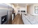 Contemporary kitchen with stainless steel appliances, granite countertops, and a spacious island at 4216 Steel Way, Sherrills Ford, NC 28673