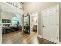 Spacious foyer featuring hardwood floors, high ceilings, and an open floor plan at 134 Lawrence Tee Ln, Mooresville, NC 28117