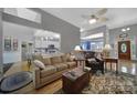 Cozy living room with hardwood floors, comfortable seating, and open access to the kitchen, perfect for entertaining at 160 Fernbrook Dr, Mooresville, NC 28117