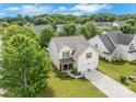 Charming two-story home featuring a well-manicured lawn, lush landscaping, and a two-car garage at 544 Cool Creek Dr, Rock Hill, SC 29732