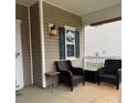 Cozy front porch featuring outdoor seating, perfect for relaxing and enjoying the neighborhood at 6509 Ridgeview Commons Dr, Charlotte, NC 28269