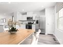 Modern kitchen with granite countertops, stainless appliances, and ample natural light at 1430 Samuel St, Charlotte, NC 28206