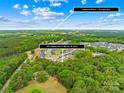 Picturesque aerial view of a neighborhood near lush greenery, highlighting the community's convenient location at 2012 Slippery Rock Ln, Monroe, NC 28112