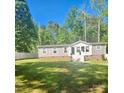 Charming home with well-manicured lawn and inviting front entrance at 2025 Kisatchie Dr, Hickory Grove, SC 29717