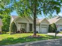 Charming home with a well-manicured lawn, a two-car garage, and beautiful landscaping at 3068 Streamhaven Dr, Lancaster, SC 29707
