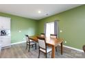 Dining room with wood flooring, wooden table and chairs, and natural light at 316 Gaines Rd, Clover, SC 29710
