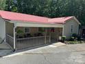 Lovely home with a spacious covered front porch, ideal for outdoor living and entertaining guests at 3690 Birchwood Ln, Denver, NC 28037