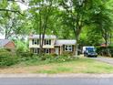 Charming two-story home with a well-manicured front yard and driveway at 4315 Chandworth Rd, Charlotte, NC 28210