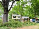 Charming two-story home with a well-manicured front yard and driveway at 4315 Chandworth Rd, Charlotte, NC 28210