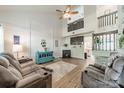 Sun-filled living room features vaulted ceilings, fireplace, and an open floor plan at 11515 Retriever Way, Charlotte, NC 28269