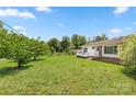 Expansive front yard showcasing a well-maintained lawn and charming single-story home at 1725 Fallston Rd, Shelby, NC 28150