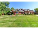 Beautiful exterior showcasing a well-maintained lawn, lush landscaping, and inviting residential charm at 532 Wilmslow Rd, Rock Hill, SC 29730