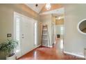 Inviting foyer featuring hardwood floors and ample natural light at 14402 Asheton Creek Dr, Charlotte, NC 28273