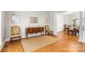 Elegant living room with hardwood floors and classic furniture arrangement at 14426 Harvington Dr, Huntersville, NC 28078