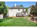 Expansive backyard with a deck, providing an ideal space for outdoor relaxation at 16028 Hallaton Dr, Huntersville, NC 28078