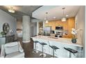 Bright kitchen features stainless appliances, quartz countertops and open floorplan at 210 N Church St # 2613, Charlotte, NC 28202