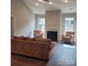 Spacious living room boasting a fireplace, hardwood flooring, and a neutral color scheme perfect for relaxation at 835 A Wynnshire Dr # 53, Hickory, NC 28601