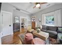 Inviting living room showcases hardwood floors, comfortable seating, and a view into the home office at 1713 Allen St, Charlotte, NC 28205