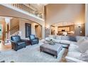 Open-concept living room with a staircase and view of the kitchen at 2215 Maycroft Dr, Charlotte, NC 28262