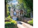 Charming home with stone accents, dormer windows, and a private driveway at 208 N 5Th St, Albemarle, NC 28001