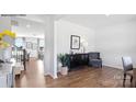 Inviting living room with hardwood floors, stylish furnishings, and an open concept design at 5536 Pamplona Way, Charlotte, NC 28214