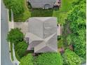 This aerial view showcases the home's roofline and surrounding green landscape at 5633 Open Book Ln, Charlotte, NC 28270