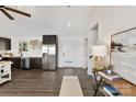 Modern kitchen featuring stainless steel appliances, dark cabinetry, and an open-concept design at 9115 Clement Cir, Terrell, NC 28682