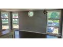 Bright dining room with large windows, perfect for Gathering meals at 124 Roxie Ln, Belmont, NC 28012