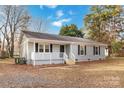 Cozy exterior view highlights this home's classic shutters and appealing curb appeal at 1637 Sumner Dr, Rock Hill, SC 29732