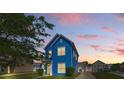 Attractive blue home with covered entry and manicured lawn at 1821 Ethel Guest Ln, Charlotte, NC 28206