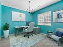 Bright home office with a modern desk, comfortable chair, and plenty of natural light at 1821 Ethel Guest Ln, Charlotte, NC 28206